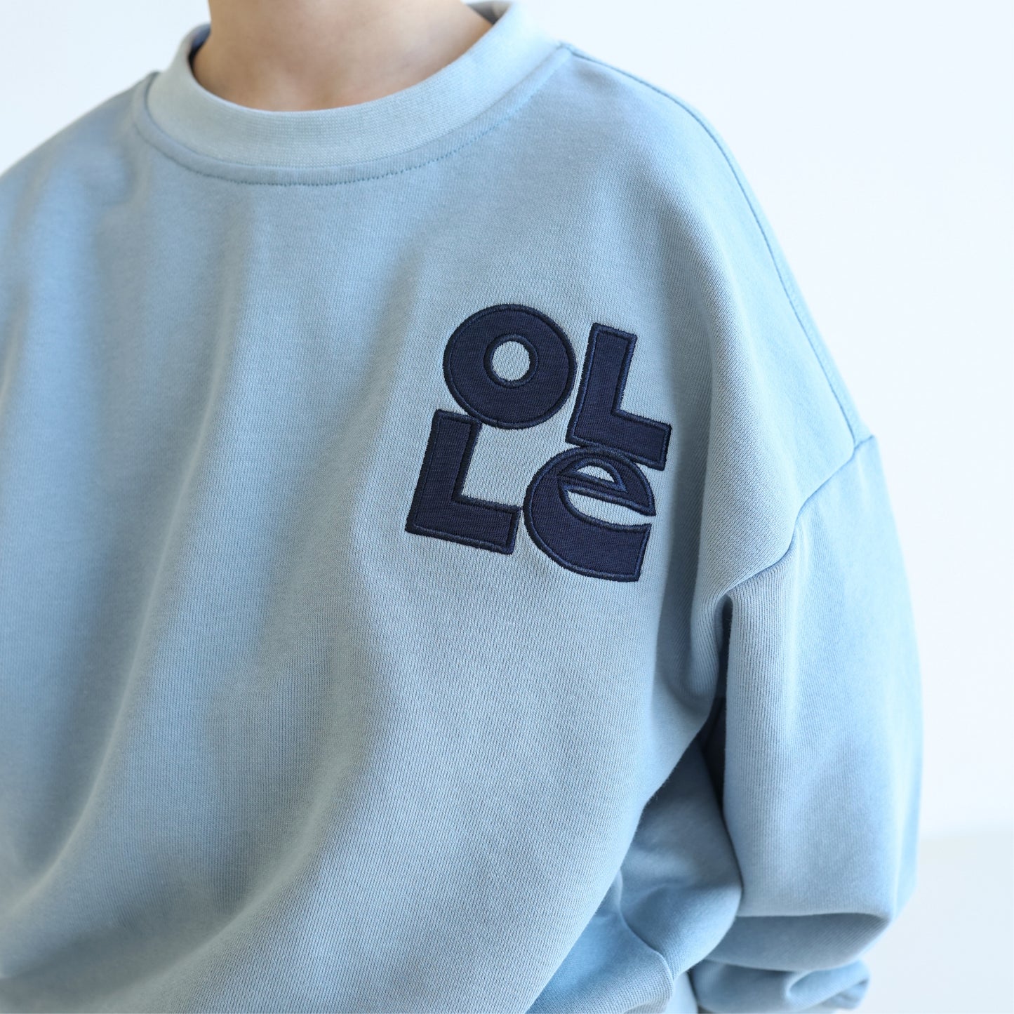 Children’s organic cotton OG Sweatshirt in Seafoam by OLLE, with French terry fabric, relaxed fit, and premium rib trims