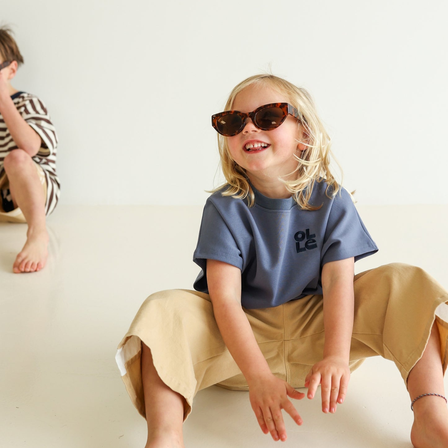 Children’s oversized organic cotton tank by OLLE, made from soft interlock fabric. Perfect for layering or wearing on its own