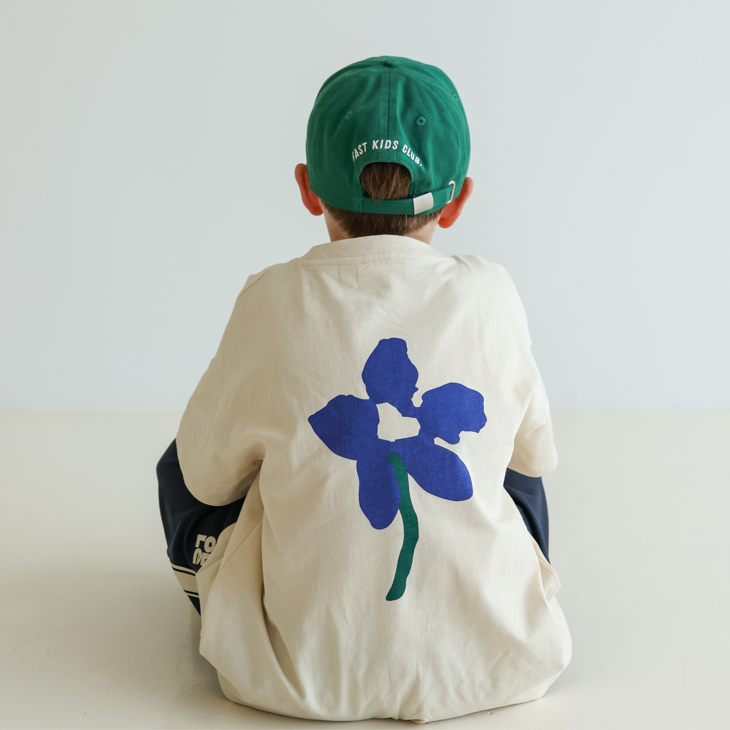 Children’s organic cotton t-shirt by OLLE in Sand colour with oversized fit and back print