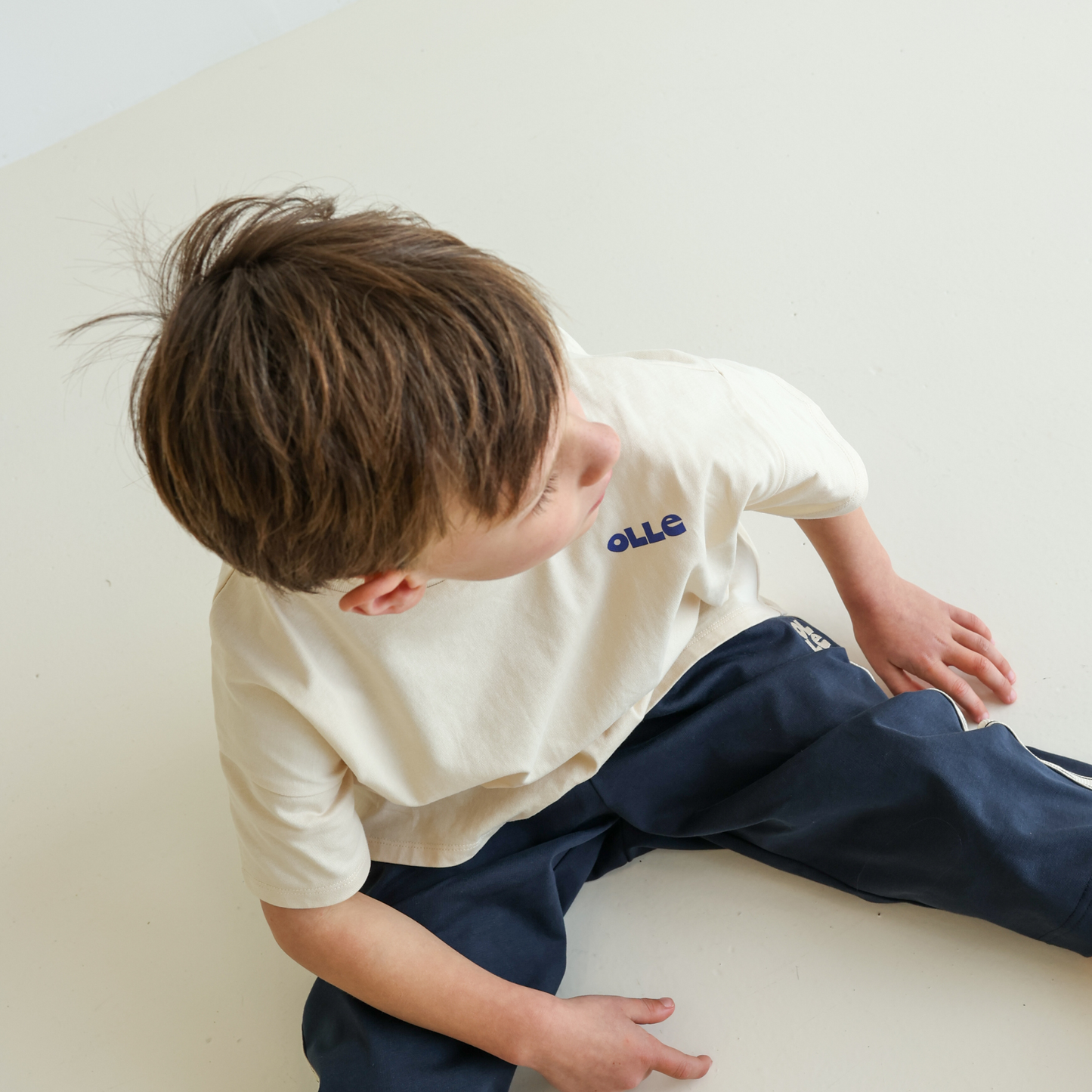 Children’s organic cotton t-shirt by OLLE in Sand colour with oversized fit and back print