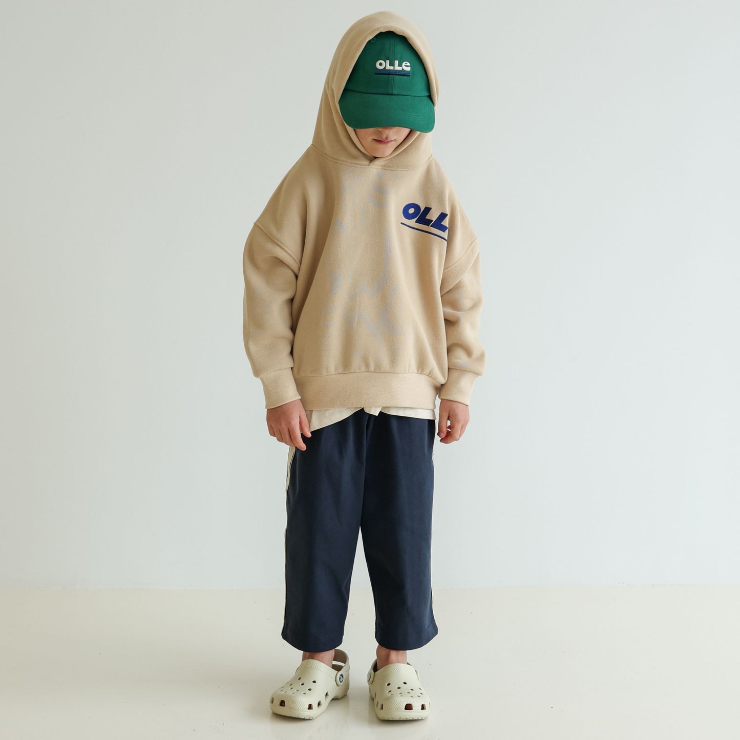 Children’s and adults’ adjustable organic cotton cap by OLLE, deeper profile with relaxed construction, responsibly made and eco-dyed
