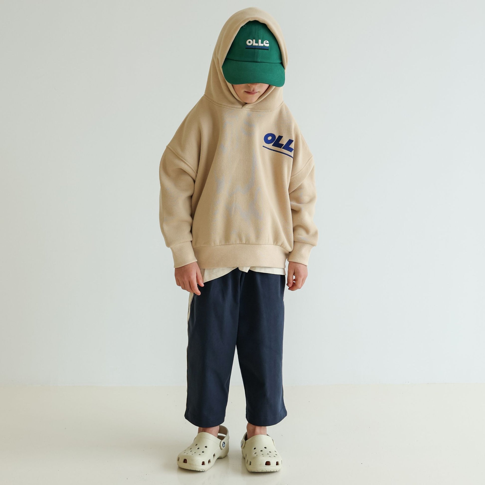 Children’s and adults’ adjustable organic cotton cap by OLLE, deeper profile with relaxed construction, responsibly made and eco-dyed
