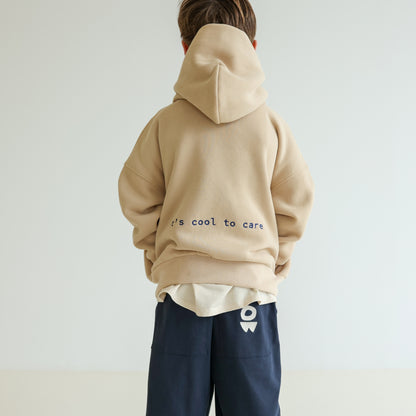Children’s organic cotton Skate Hoodie in Sand by OLLE, with relaxed fit, embroidery, and double-layer hood