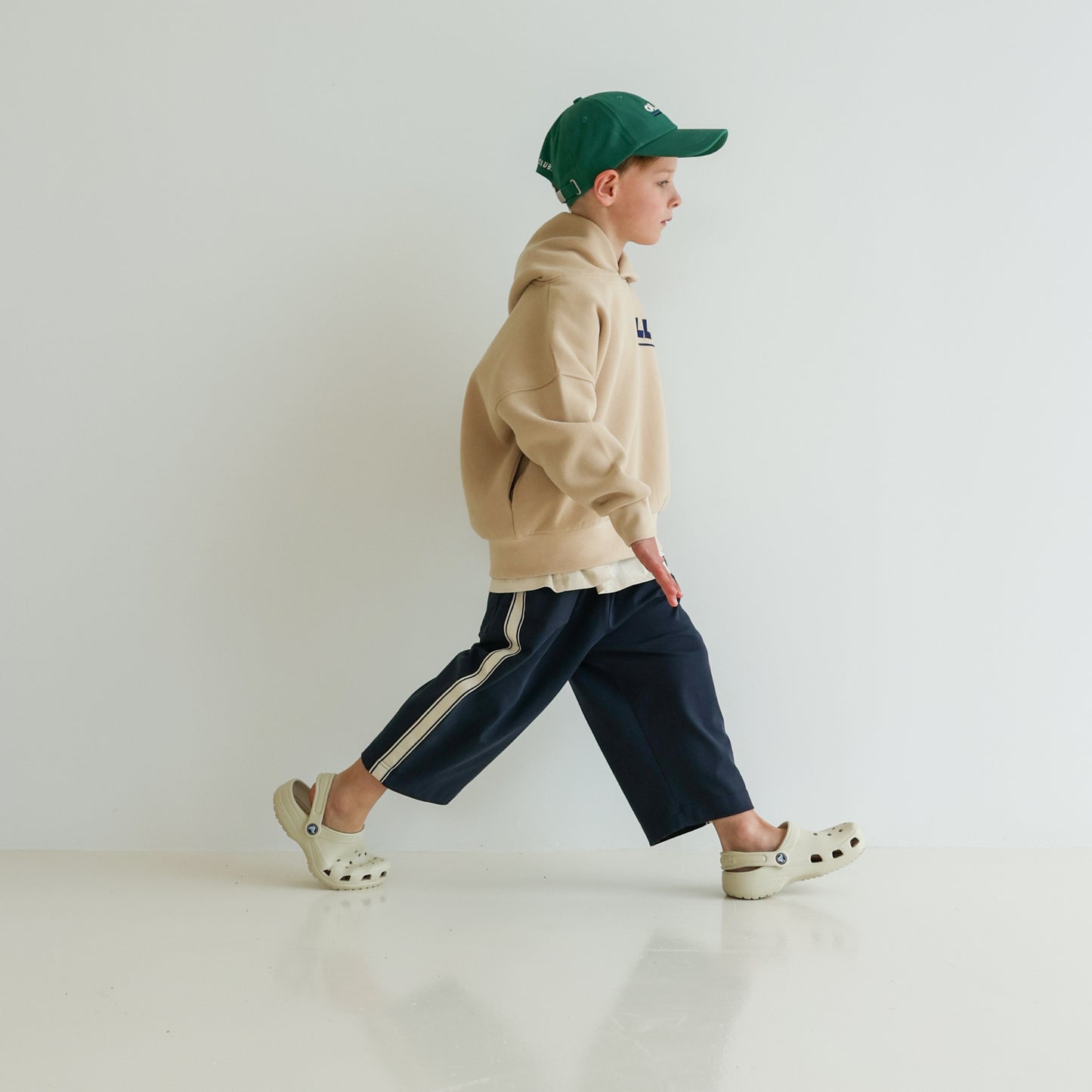 Children’s organic cotton Skate Hoodie in Sand by OLLE, with relaxed fit, embroidery, and double-layer hood