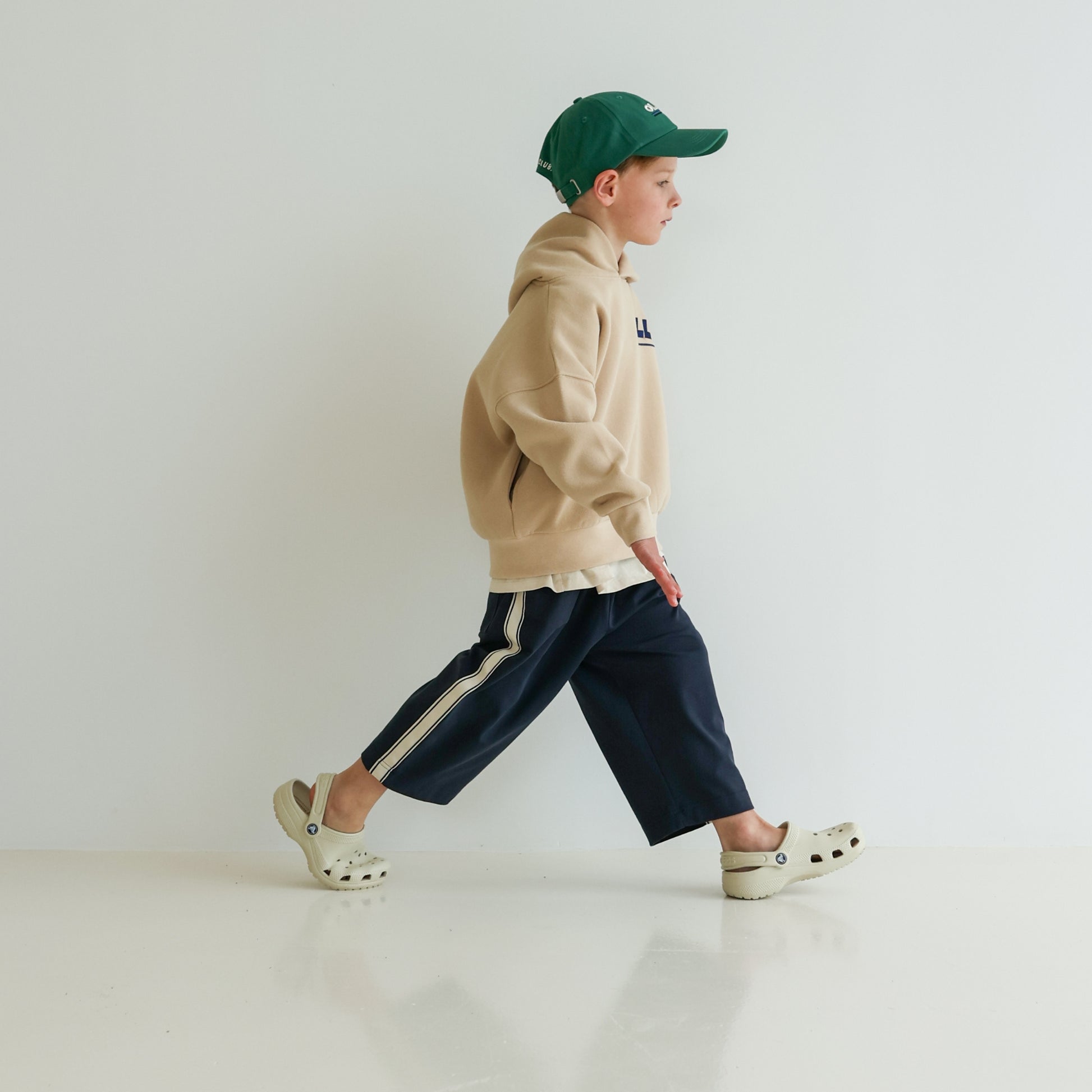Children’s organic cotton Skate Hoodie in Sand by OLLE, with relaxed fit, embroidery, and double-layer hood