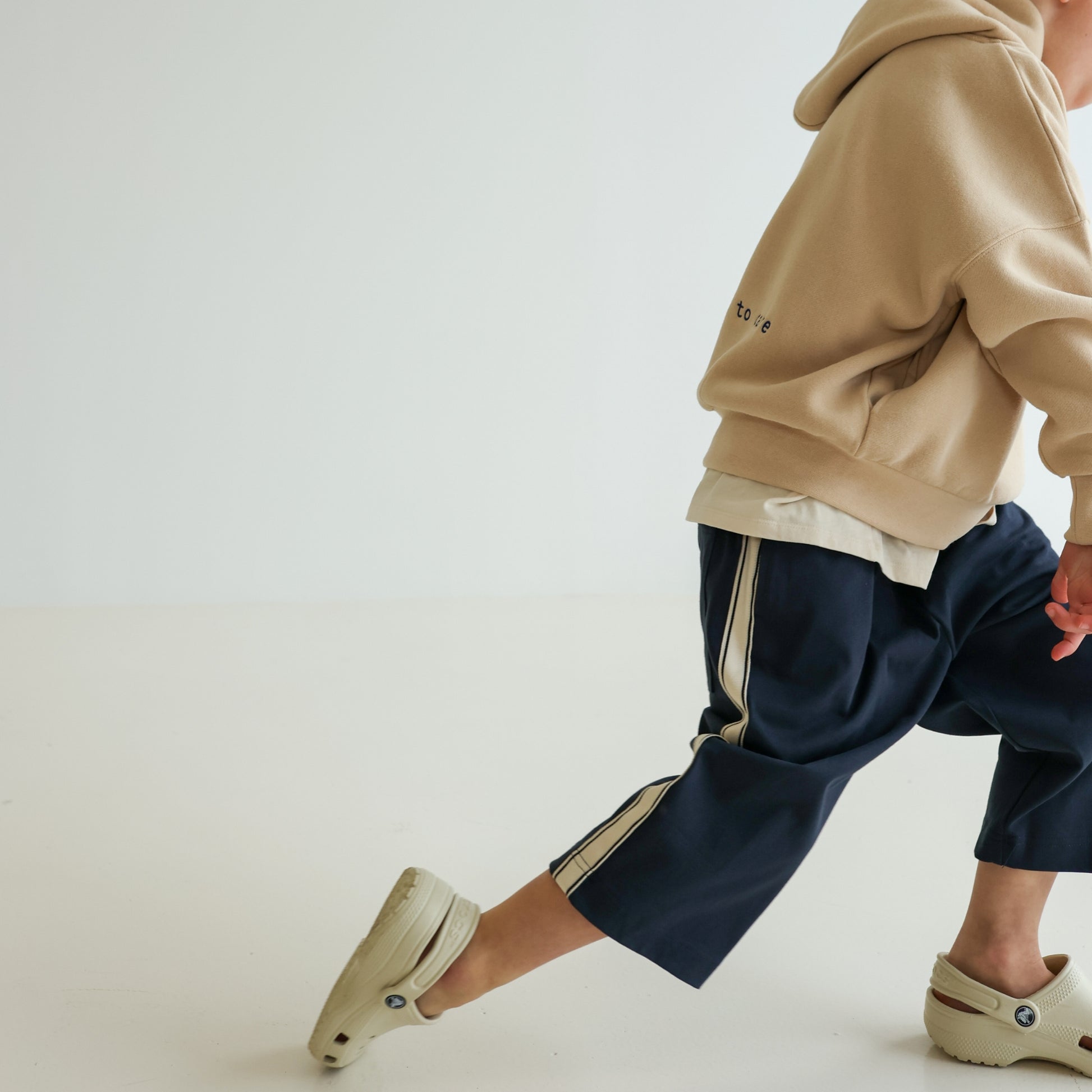 Children’s organic cotton Skate Hoodie in Sand by OLLE, with relaxed fit, embroidery, and double-layer hood