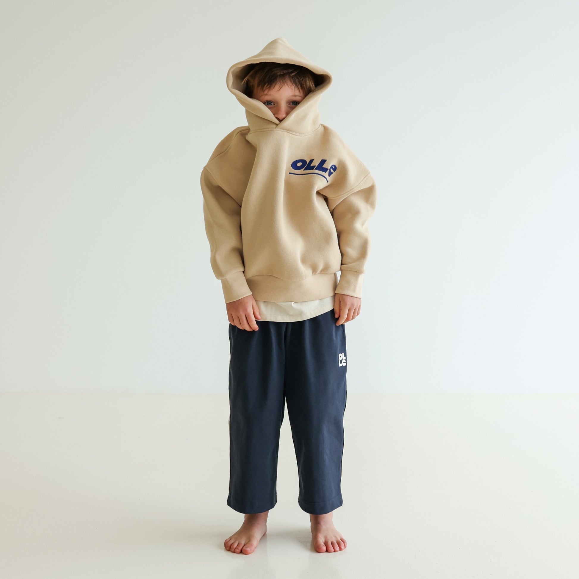 Children’s organic cotton Skate Hoodie in Sand by OLLE, with relaxed fit, embroidery, and double-layer hood