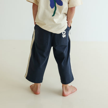 Children’s organic cotton Alltime Crop Pant in Midnight by OLLE, with cropped length and drawstring waist