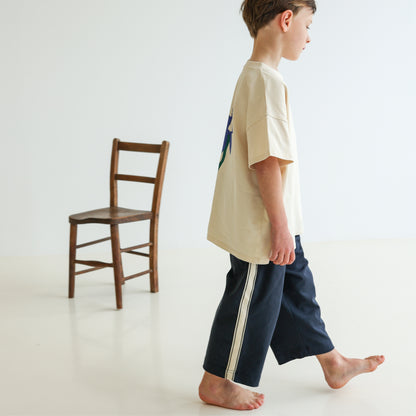 Children’s organic cotton Alltime Crop Pant in Midnight by OLLE, with cropped length and drawstring waist