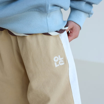 Children’s organic cotton Alltime Crop Pant in Sand by OLLE, with cropped length and drawstring waist.
