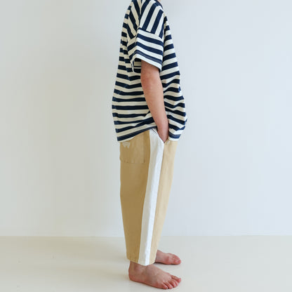Children’s organic cotton Alltime Crop Pant in Sand by OLLE, with cropped length and drawstring waist.