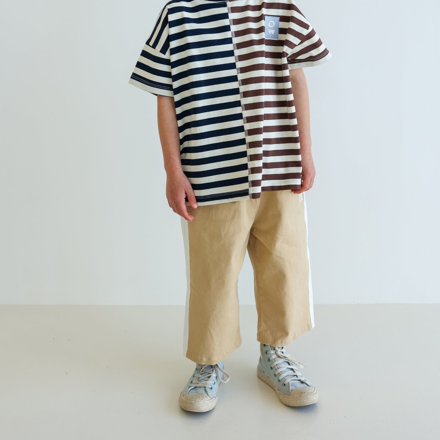 Children’s organic cotton Alltime Crop Pant in Sand by OLLE, with cropped length and drawstring waist.