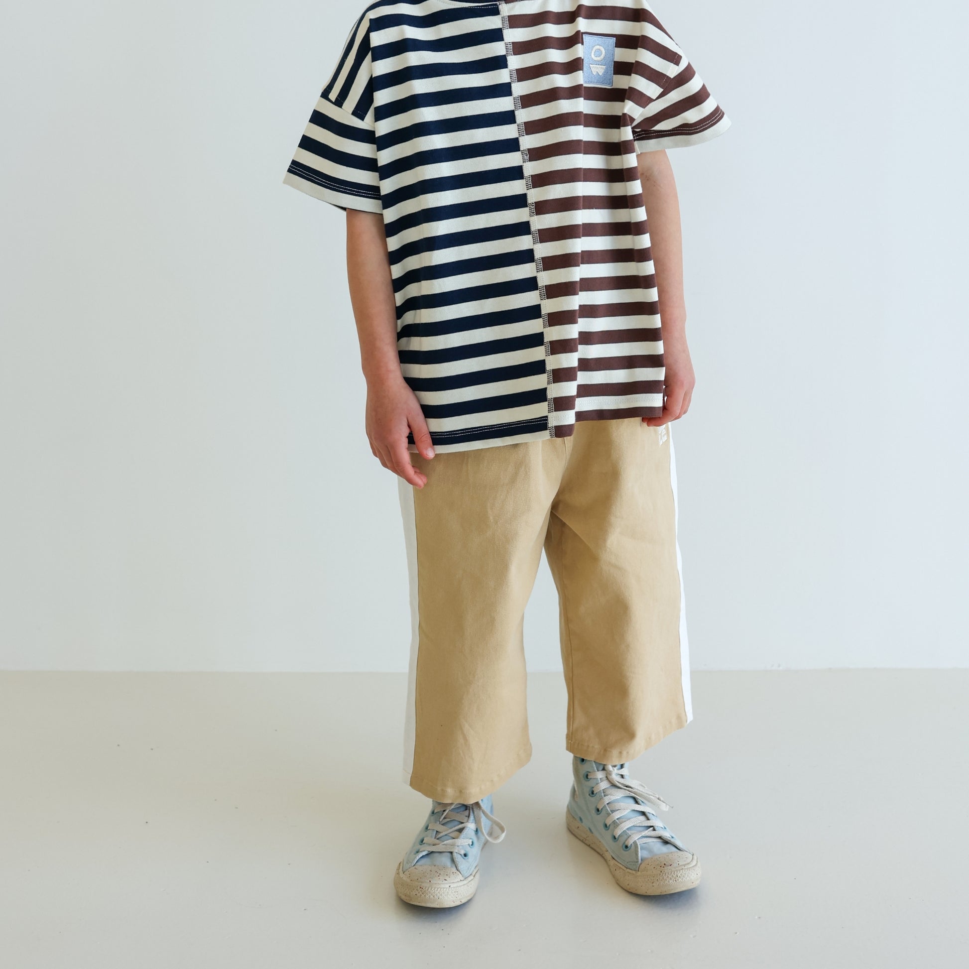 Children’s organic cotton Alltime Crop Pant in Sand by OLLE, with cropped length and drawstring waist.