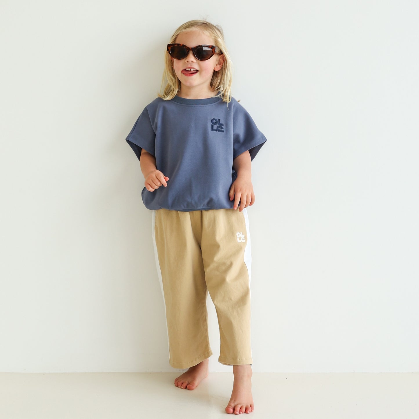 Children’s oversized organic cotton tank by OLLE, made from soft interlock fabric. Perfect for layering or wearing on its own