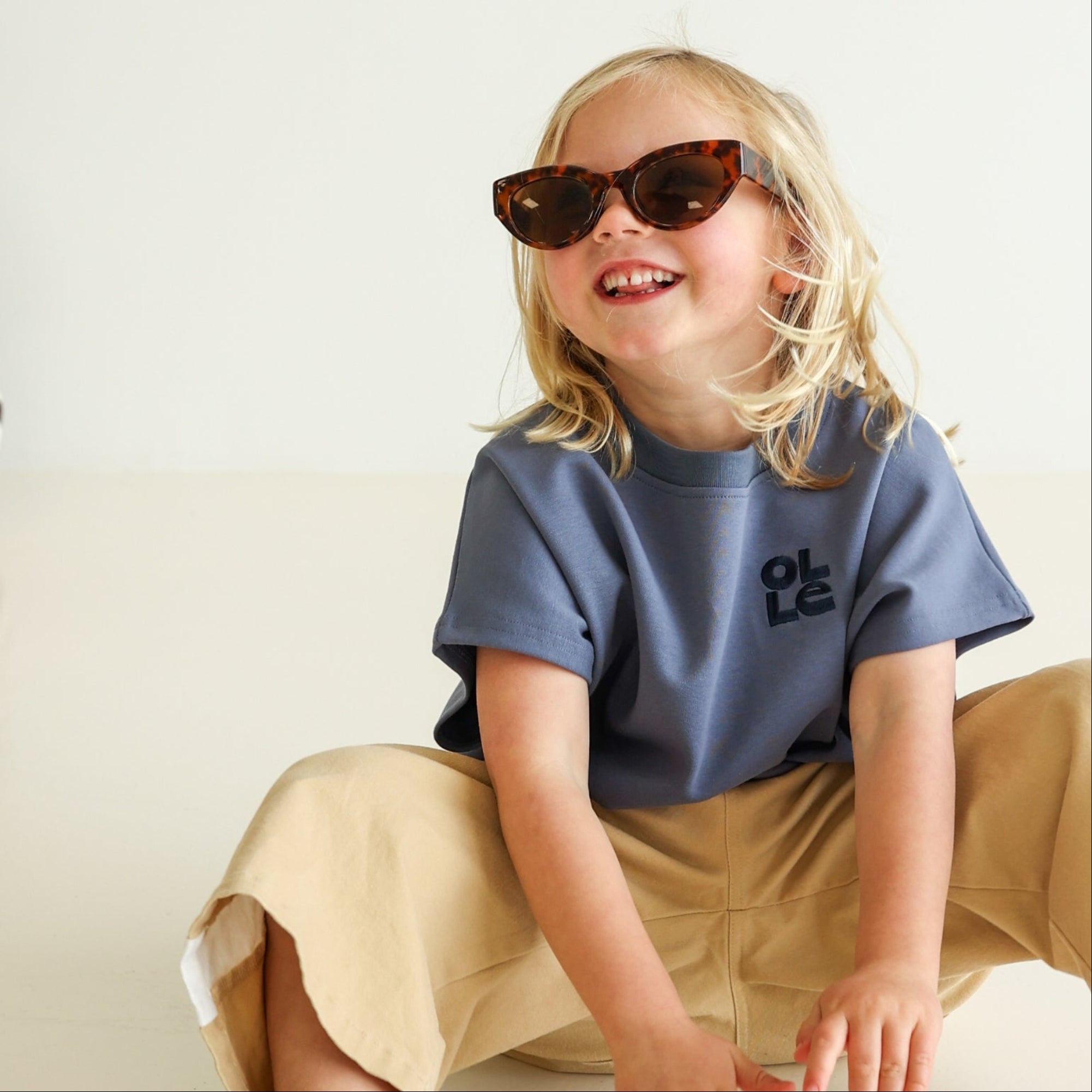 Children’s oversized organic cotton tank by OLLE, made from soft interlock fabric. Perfect for layering or wearing on its own