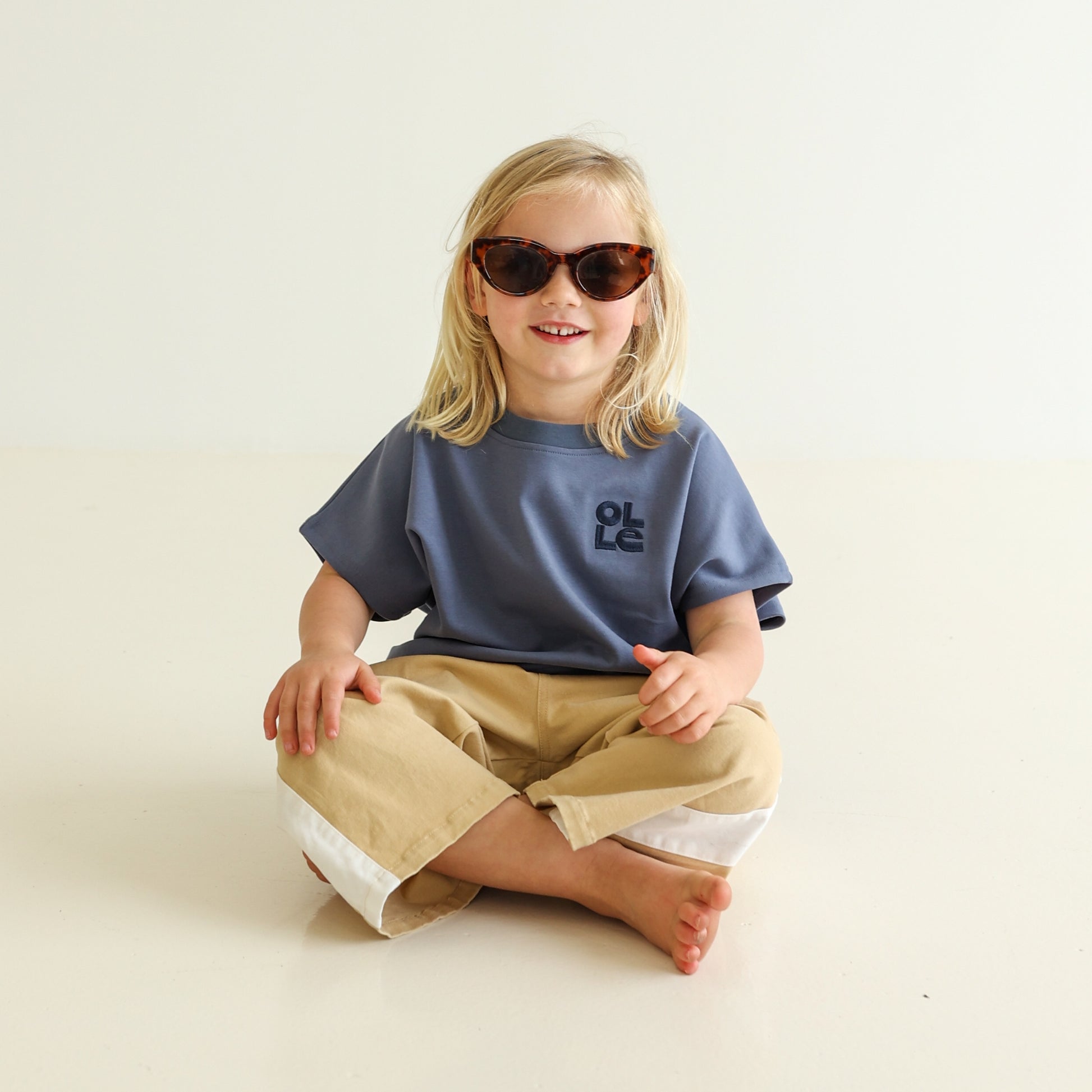 Children’s oversized organic cotton tank by OLLE, made from soft interlock fabric. Perfect for layering or wearing on its own