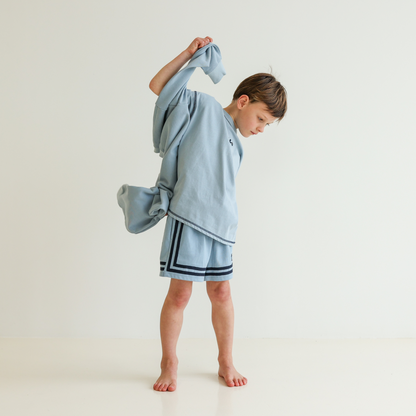 Children’s oversized organic cotton Topstitch Tee in Seafoam by OLLE, with contrast stitch and skate logo